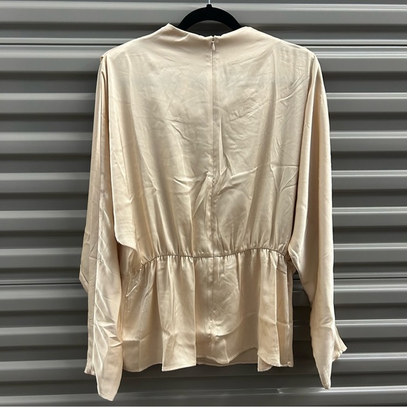 Ivory Peplum Style Blouse - Picture 6 of 8